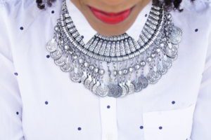 Tatiana wearing a silver necklace